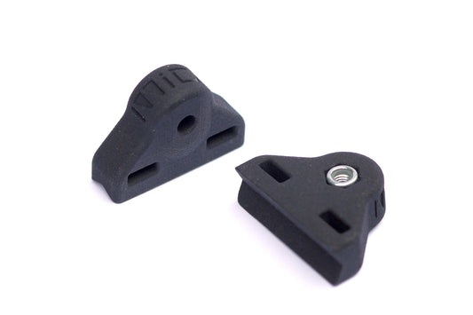 Close up of Mica Cycles seat stay mounting blocks.